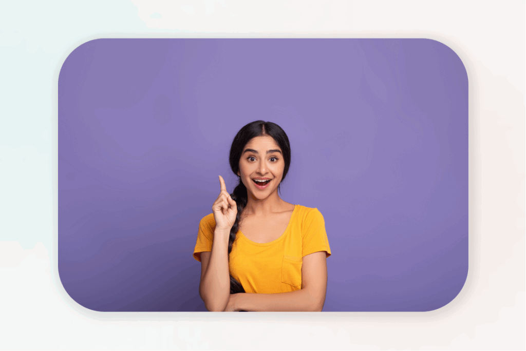 Excited woman pointing up – idea or solution for making money online.