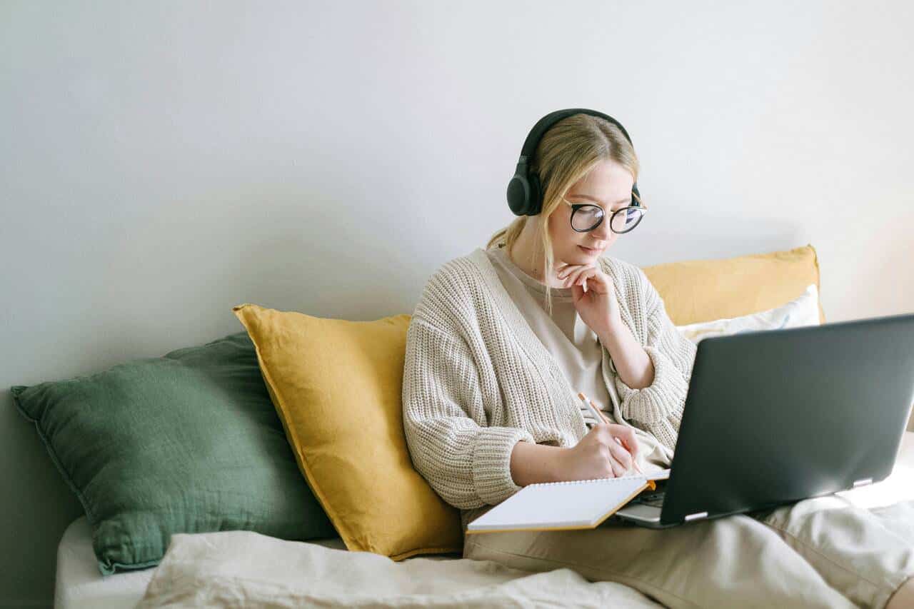 Lady working remotely from home - remote work opportunities for moms