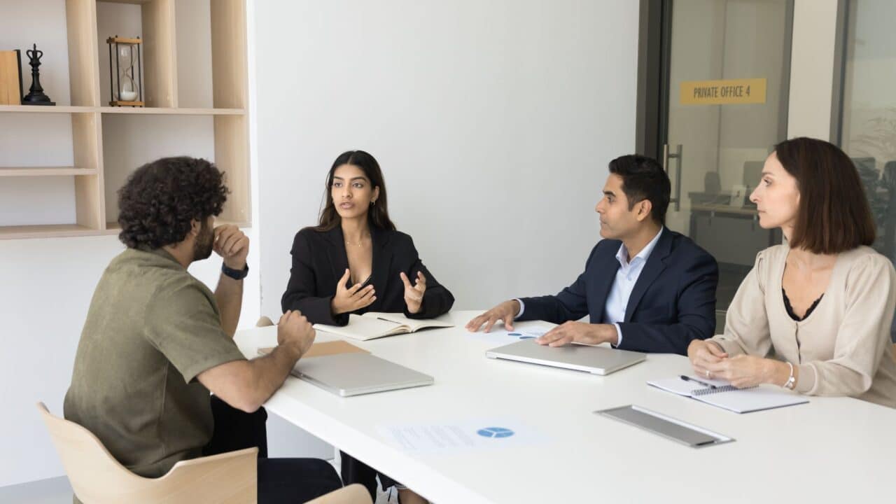 2_business_meeting_team_discussing_strategy